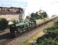 Rebuilt Bulleid West Country Pacific no 34046 <I>Braunton</I> heading south-west out of Bristol on 18 August 2013. The recently restored locomotive is about to pass through Parson Street Station with the 09.15 Bristol Temple Meads - Kingswear <I>Torbay Express</I>. [See image 43812]<br>
 <br>
<br><br>[Peter Todd 18/08/2013]