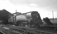 Bulleid West Country Pacific no 34091 <I>Weymouth</I> prepared for a change in the weather at Eastleigh in September 1963.<br><br>[K A Gray 25/09/1963]