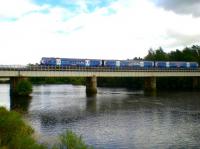 The 10.38 Aberdeen to Glasgow Queen St crossing the River Tay on 16 August 2013 on the approach to Perth station.<br><br>[Malcolm Chattwood 16/08/2013]