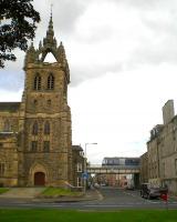 The 0941 Glasgow Queen Street to Aberdeen service, formed by a Class 170 Turbostar, leaves Perth station on 16 August and heads for the Tay Viaduct, passing the church of St Leonards-in-the-Field. <br><br>[Malcolm Chattwood 16/08/2013]