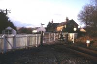 Burneside level crossing on the Windermere Line in March 1993, looking north over Hollins Lane towards the station. [With thanks to all who responded to this query]<br><br>[Ian Dinmore /03/1993]