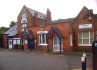 The 1862 station building at Hinckley between Nuneaton and Leicester in August 2013.  The building provides a home for an IT company, contains a vacant business unit, houses a therapist, accomodates a picture framing company. Oh yes... there's a railway ticket office as well.<br><br>[Ken Strachan 17/08/2013]