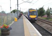 The 10.21 ex-Cowdenbeath arrives at journey's end at Newcraighall on 9 August 2013 at 11.36. The train will depart north as the 11.47 for Glenrothes with Thornton.<br><br>[John Furnevel 09/08/2013]