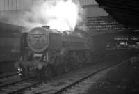 70038 <I>Robin Hood</I> waits on the centre road at Carlisle to take over a northbound service on a July evening in 1966.<br><br>[K A Gray 30/07/1966]