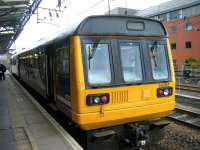 Northern Pacer 142067 stands at Newcastle Central on 12 June 2013 with a service from Carlisle.<br><br>[Veronica Clibbery 12/06/2013]