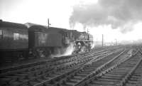 Kingmoor's Britannia Pacific no 70039 <I>Sir Christopher Wren</I> heads south out of Carlisle in January 1965, shortly after taking over the 9am Perth - Euston.<br><br>[K A Gray 30/10/1965]