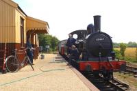 Scene at Brockford station on the Mid-Suffolk Light Railway in the summer of 2002. J15 0-6-0 no 65447 of 1899 vintage stands alongside the platform.<br><br>[Ian Dinmore /07/2002]