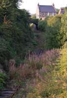 Looking north near Inverkeithing harbour along the Rosyth branch on 25 August.  Weeds seem to be taking over; in contrast, some major bridge construction in connection with the Queensferry Crossing approaches will preserve the route for the future....<br><br>[Bill Roberton 25/08/2013]