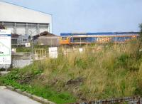 Looking towards Tyne Dock coal loading point reception sidings adjacent to the Cemex concrete plant on Jarrow Road on 25 August 2013. Locomotives present include recently imported GBRf 66748 alongside classmate 66737.<br><br>[David Pesterfield 25/08/2013]