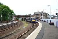 170419 calls at Cupar on the way to Dundee on 22 August. Alongside the other platform a squad from Babcock Rail were showing interest in the semaphore signal. <br><br>[John Gray 22/08/2013]