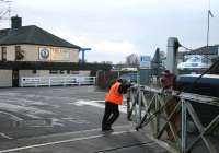 Eric Sadler opening the gates at Brundall on 1 May 2006. <I>Wonder what he's looking forward to at the end of his shift...</I> <br><br>[Ian Dinmore 01/05/2006]