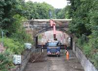 Bridgeworks on the B6392 north of Eskbank station on 28 August 2013 looking along the trackbed towards Sheriffhall. <br><br>[John Furnevel 28/08/2013]