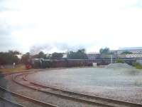 The outgoing <I>Scarborough Flyer</I>, with 46233 at the head and class 37516 tucked in behind, rounding the curve towards Stalybridge after passing through Guide Bridge on 30 August. Seen from the waiting 08.25 ex Leeds to Manchester Airport TransPennine Express service held for the special to cross over from the Stockport line.<br><br>[David Pesterfield 30/08/2013]
