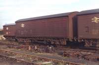 These air braked four wheel vans of type COV AB, standing in Millerhill Yard on 2nd December 1970, can only have been a few months old at the time (the one on the right bears the number 200001 so was presumably the first of its type).<br><br>[Bill Jamieson 02/12/1970]