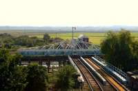 Reedham swing bridge stands open to traffic on the River Yare in September 2004. [See image 44417]<br><br>[Ian Dinmore /09/2004]