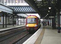 SPT-liveried 170474 arrives at Stirling's platform 2 on a grey and overcast January afternoon in 2005 with a Glasgow Queen Street - Dunblane service.<br><br>[John Furnevel 12/01/2005]