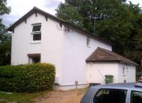 The crossing keeper's cottage at Leasey Bridge Lane is now an attractive house. The car in the foreground (there are 2 or 3 parking spaces) appears to belong to a walker heading North on the railway trail - perhaps to the site of Harpenden East station, about a mile away [see image 44205].<br><br>[Ken Strachan 09/08/2013]