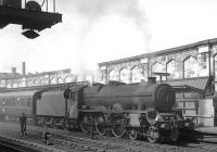 The 12.40pm Gourock - Leicester/Manchester <I>CTAC Scottish Tours Express</I> prepares to leave Carlisle platform 4 on Saturday 17 July 1965 behind Jubilee 4-6-0 no 45573 <I>Newfoundland</I>.<br><br>[K A Gray 17/07/1965]