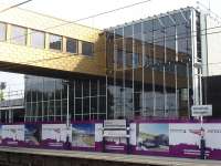 Glazing has now been fitted to the platform face on the atrium section of the new Wakefield Westgate main station building located to the north end of the up platform.<br><br>[David Pesterfield 04/09/2013]