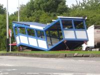 What appears to be a part steps section for a railway station footbridge seen on a trailer parked at Woolley Edge M1 Services near Wakefield on 31 August.<br><br>[David Pesterfield 31/08/2013]