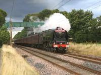 The returning 75th Anniversary special from Perth to�Sheffield on 7 September, with 46233 <I>Duchess of Sutherland</I> at speed on the Brock straight. A nice touch was provided by the burnished buffers displaying the letters LMS. The Duchess hauled the tour south as far as Crewe.<br><br>[John McIntyre 07/09/2013]