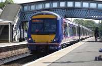 107421 and a 158 unit at Dunblane with the 13.45 Glasgow Queen Street - Perth on 21 July.  The covered footbridge in the background is to be replaced by an <I>electrification-friendly</I> structure and will be moved to the Caledonian Railway at Bridge of Dun.<br><br>[Bill Roberton 21/07/2013]