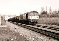 58006 Didcot bound with a coal train in January 1991, passing through Radley station, just south of Oxford.<br><br>[Peter Todd 04/01/1991]