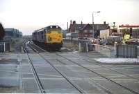 A pair of class 31s on the crossing at Sleaford East in December 1983 while running round a railtour.<br><br>[Ian Dinmore //1983]