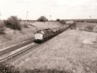 37131 approaching Westbury station, on the Bath line, heading for Weymouth hauling a coal train from South Wales on 21 February 1990. <br>
<br><br>[Peter Todd 21/02/1990]