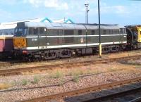 31190 was so ashamed of its matt and faded BR green paintwork at Eastleigh on 1st August, that it tried to hide behind a lamp post. But railway photographers are observant folk.<br><br>[Ken Strachan 01/08/2013]