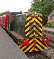 My notes say: D2700 has works number 27426 from 1955 and contrasts nicely with the red coach behind it. Other platform must be near France: has sign Toulouse. If only I could remember who made the engine.<br><br>[Ken Strachan 20/07/2013]