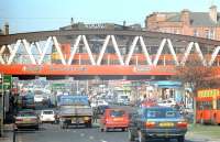 A class 303 EMU crosses Glasgow's Great Western Road at Anniesland in 1991. View is west, with Anniesland station just off to the right.<br><br>[Ewan Crawford //1991]