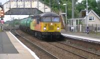 Colas Rail freight 56105 on 6N47 empty A1 aviation fuel oil tanks from Prestwick airport to Grangemouth passing through Barassie station on 20 August 2013.<br><br>[Ken Browne 30/08/2013]