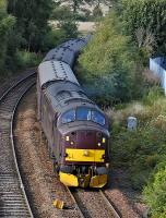 37516 hauls the empty stock from the previous day's SRPS Inverurie - Oban trip back to Bo'ness from Aberdeen past Inverkeithing Central junction on 15 September. Deltic 55022 brought up the rear of the train [see image 44581]. <br><br>[Bill Roberton 15/09/2013]