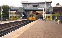 Merseyrail 508130 arrives at Kirkdale with a service to Liverpool Central on 15 September 2013. The modern station building stands high above the tracks.[See image 31286] for a view in the opposite direction.<br><br>[John McIntyre 15/09/2013]