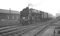 The 9.20am Manchester Victoria - Glasgow Central about to run into Carlisle on 3 August 1963. The train was routed via Hellifield and Kilmarnock and the locomotive on this occasion is rebuilt Patriot 4-6-0 no 45531 <I>Sir Frederick Harrison</I>.<br><br>[K A Gray 03/08/1963]