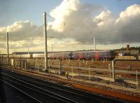 The early evening sun reflects off three First Great Western Networker 3 car DMU sets stabled at the east end of the new Reading Train Care Depot on 19 September [see image 44087]. <br><br>[David Pesterfield 19/09/2013]