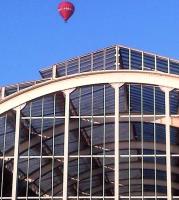 Possibly as relaxing as an S&D steam train - a hot air balloon spotted above Green Park station in July 2013.<br><br>[Ken Strachan 06/07/2013]