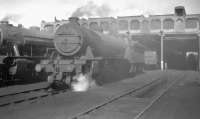 Sunshine on Scunthorpe. Gresley O2 2-8-0 no 63940 takes a break on a hazy Frodingham shed on 27 May 1961. The Doncaster locomotive had likely arrived at the nearby steelworks earlier with a coal train from South Yorkshire.<br><br>[K A Gray 27/05/1961]