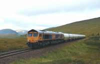 GBRf 66737 <I>Lesia</I> photographed on the long climb up to Corrour Summit on 23 September with a train of empty alumina tanks from Fort William to North Blyth.<br><br>[John Gray 23/09/2013]