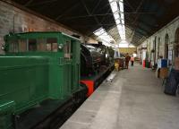 Looking east inside the train shed along the former up platform at Kirkby Stephen East station on 21 September 2013.Nearest the camera is a Planet 4w DM shunter and behind it Peckett 0-4-0ST <I>F.C. Tingey</I> (2084/1948).<br><br>[John McIntyre 21/09/2013]