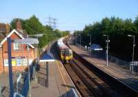 If you look at a railway map, Redbridge (West of Southampton) may look like a good place to watch both freight and passenger operations. In practice, a rake of empty container flats was the only sign of freight and most passenger trains passed through without stopping. There was also little shade from the sun. Lesson learned!<br><br>[Ken Strachan 01/08/2013]