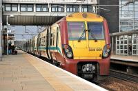 334007+334040 forming a service to Helensburgh Central call at Edinburgh Park on 23 September 2013.<br><br>[Bill Roberton 23/09/2013]