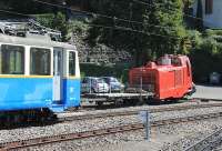 <I>Not the most handsome of locomotives (but it has character)</I>. This is MTGN No.4, a diesel used for maintenance trains on the Rochers de Naye electric cog railway. Originally built by Brienz in 1973 it arrived on this line in 1996 but was rebuilt in their workshops in 2009, re-engined and fitted with a larger bonnet. It is seen stabled at Glion station, near the line's maintenance depot, alongside railcar 207, dating from 1949. <br><br>[Mark Bartlett 09/09/2013]