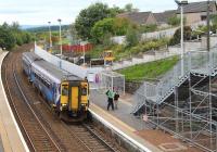 The 1218 Glasgow Central - Edinburgh Waverley, photographed shortly after arrival at Shotts station on 23 September 2013. Work is currently underway here on the provision of access for disabled passengers to the eastbound platform.<br><br>[John Furnevel 23/09/2013]