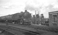 Heaton carriage sidings on 11 April 1964, featuring Gresley V3 2-6-2T no 67628 on a train of empty stock.<br><br>[K A Gray 11/04/1964]