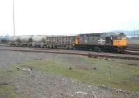 Class 26 no 26041 shunting the yard at Dundee West on a grey 18 January 1989. View is east, with the Tay Road Bridge visible in the background.<br><br>[Ewan Crawford 18/01/1989]