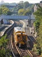 A Network Rail <I>stoneblower</I> runs north through Inverkeithing  station on 29 September.New rails have been set out here ready for installation.<br><br>[Bill Roberton 29/09/2013]