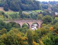 View north west across the Esk Valley at Lasswade on 27 September 2013. Lasswade viaduct crosses the picture, with the trackbed of the Polton branch continuing along the valley to the left and the former Lasswade station and Broomieknowe Tunnel just off picture to the right.<br><br>[John Furnevel 27/09/2013]