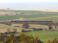A long distance shot of the 1330 ex-Sheringham between there and Weybourne on 2 October 2012. The locomotive is former LNER B12 4-6-0 no 8572. <br><br>[Bruce McCartney 02/10/2012]